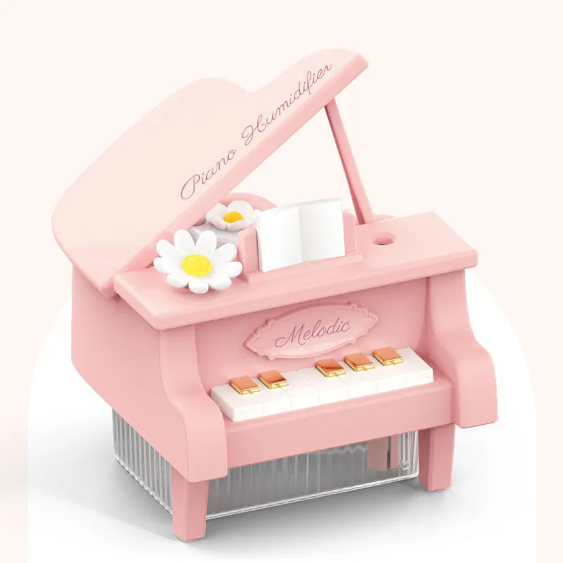 Small square plastic ultrasonic aroma diffuser in pink, USB powered, with built-in battery and timer