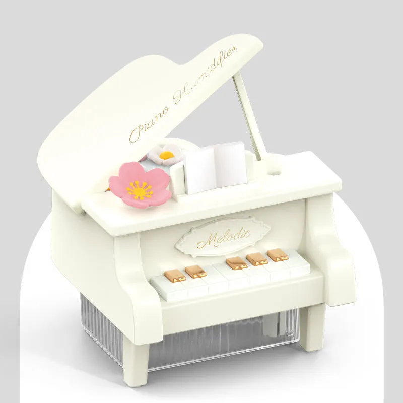 Small square plastic ultrasonic aroma diffuser in pink, USB powered, with built-in battery and timer