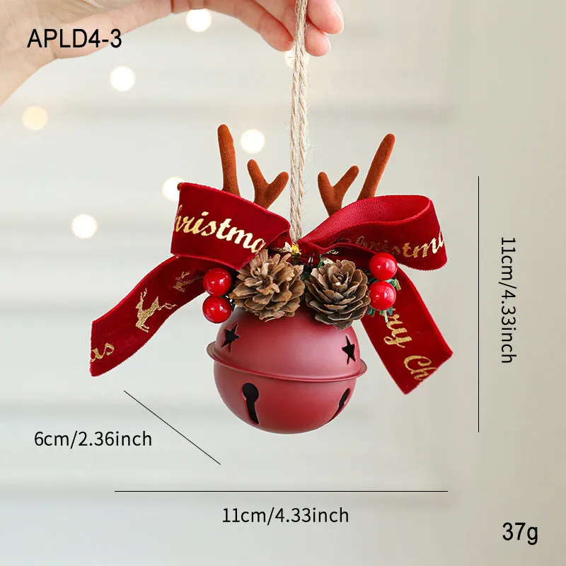 Wrought iron window hanging ornament with a jingling bell, antlers, and pine cone design in a choice of colours.