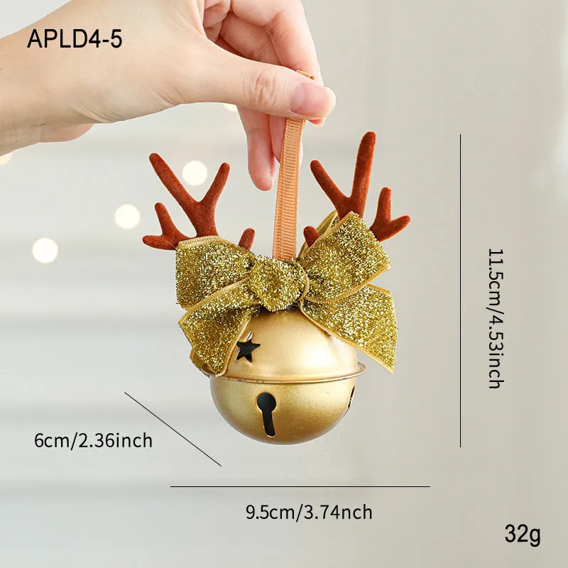 Wrought iron window hanging ornament with a jingling bell, antlers, and pine cone design in a choice of colours.