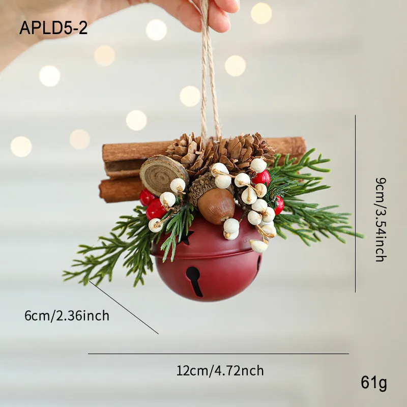 Wrought iron window hanging ornament with a jingling bell, antlers, and pine cone design in a choice of colours.