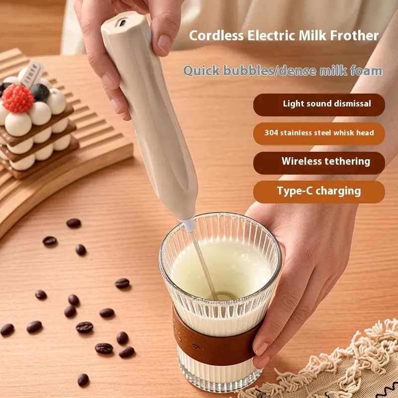 Handheld personalised milk frother in beige, black, or white with stainless steel whisk and Type-C charging port.