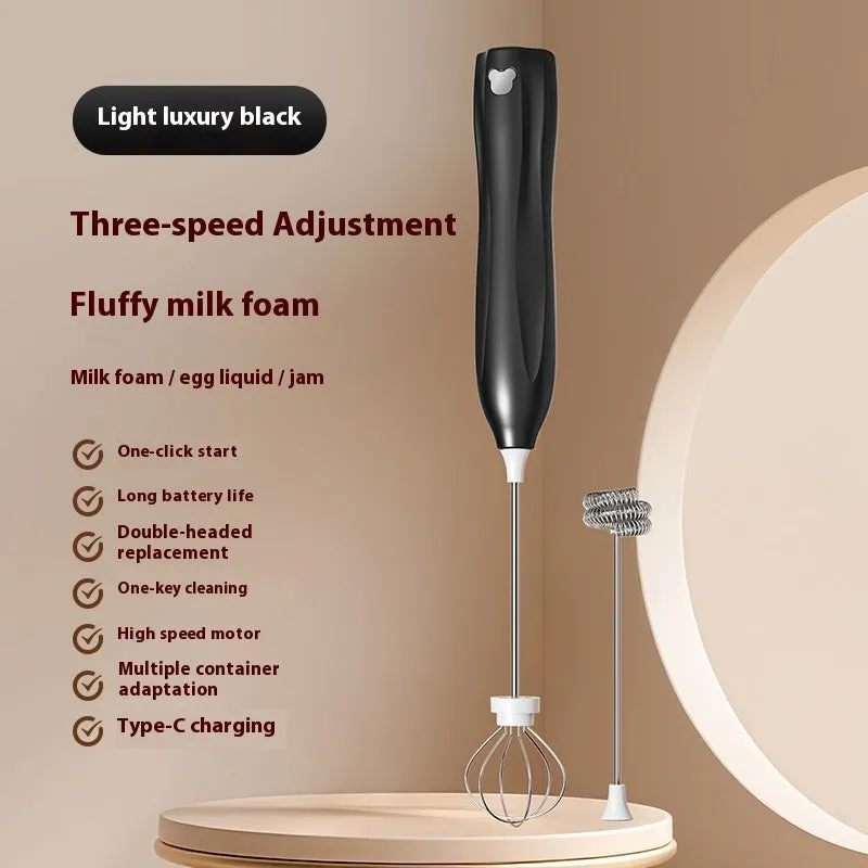 Handheld personalised milk frother in beige, black, or white with stainless steel whisk and Type-C charging port.