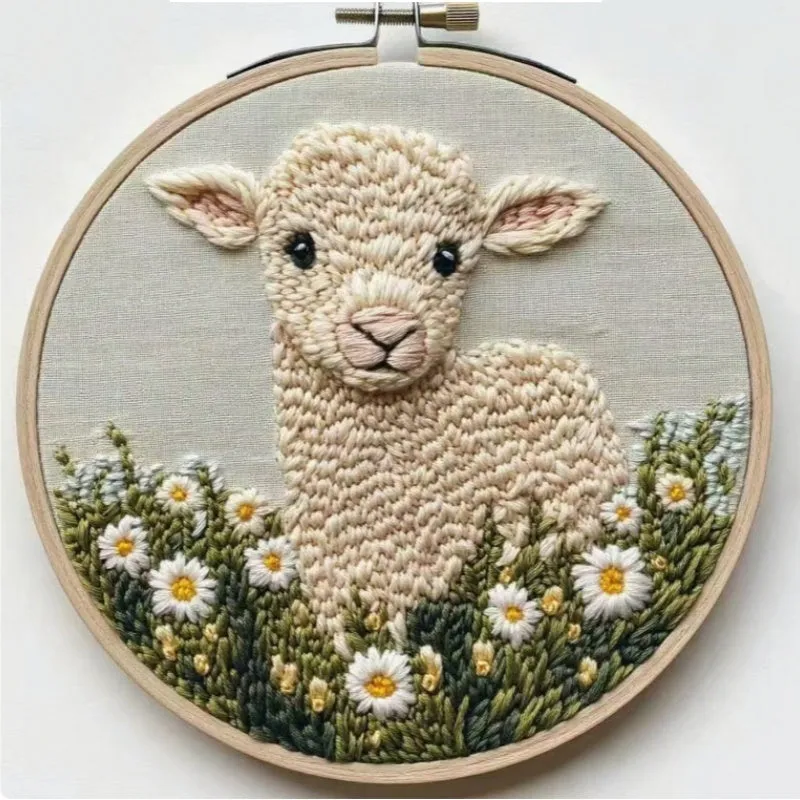Beginner embroidery craft kit showing cartoon animal patterns including turtle, sheep, and butterfly on cloth