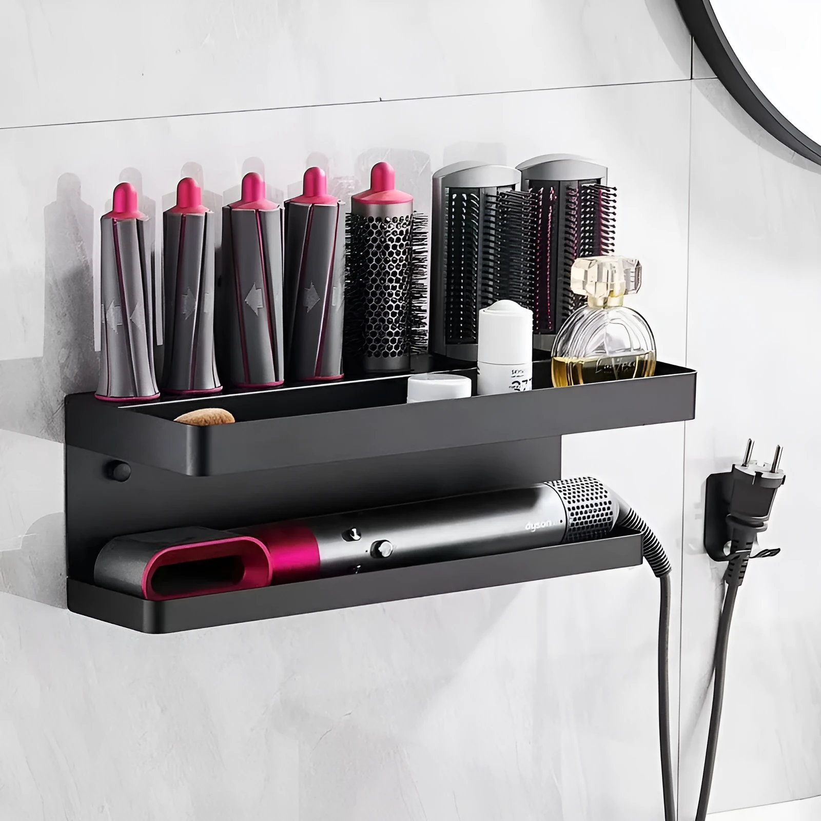 White double-layer punch-free aluminium rack holding hair curlers on a bathroom wall.