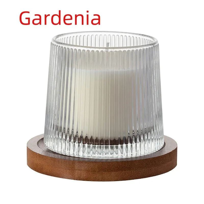 Soy wax aromatherapy candle in cup shape with rotating design, available in seven scent options