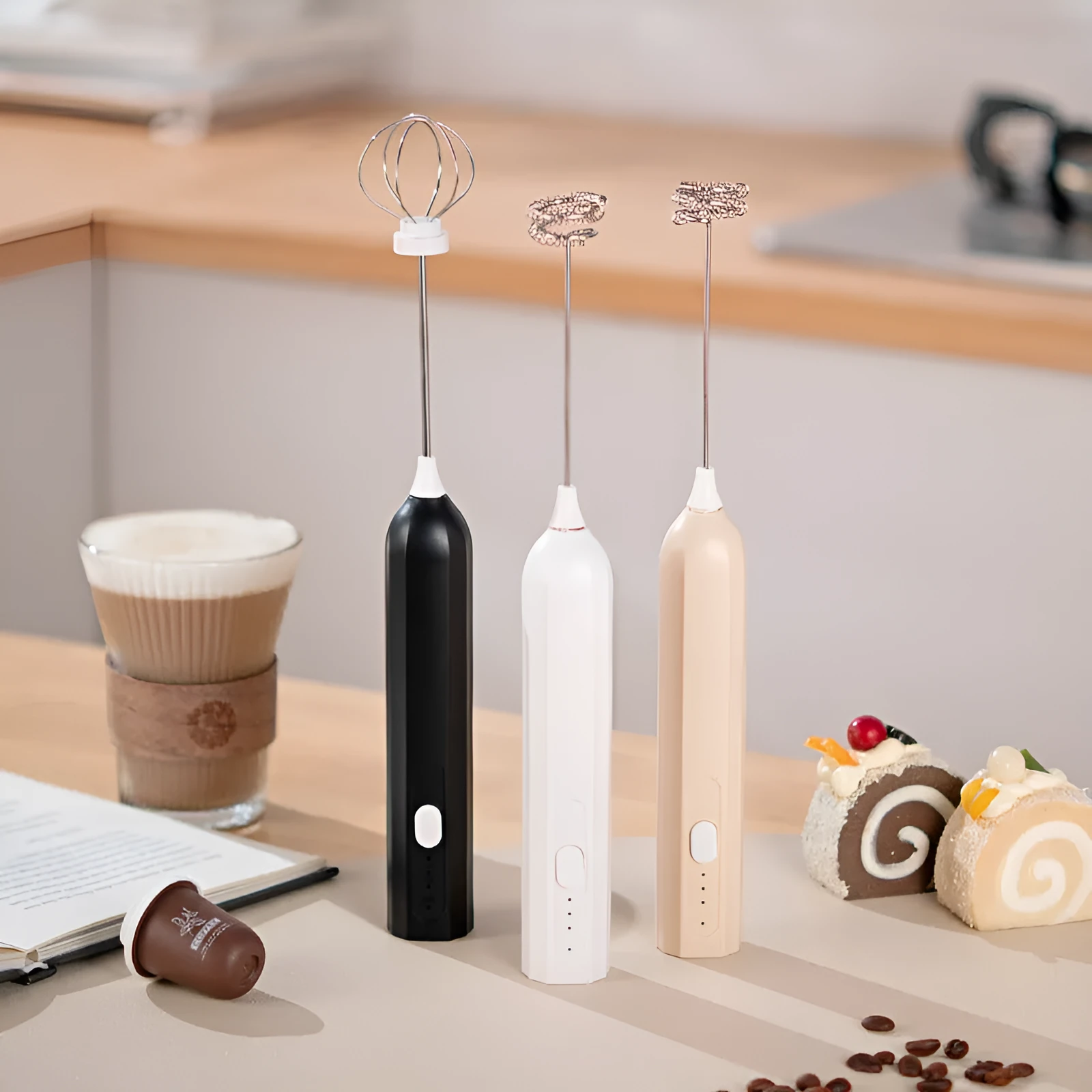 USB rechargeable handheld electric whisk in white with three speed settings and egg beater attachment