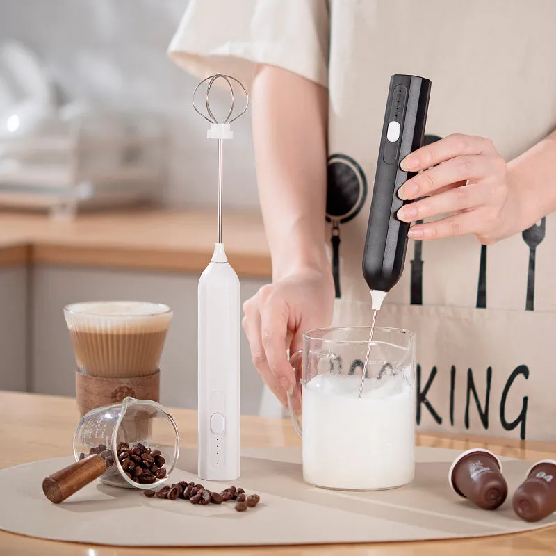 USB rechargeable handheld electric whisk in white with three speed settings and egg beater attachment