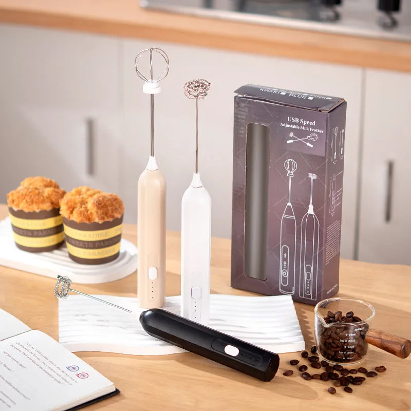 USB rechargeable handheld electric whisk in white with three speed settings and egg beater attachment