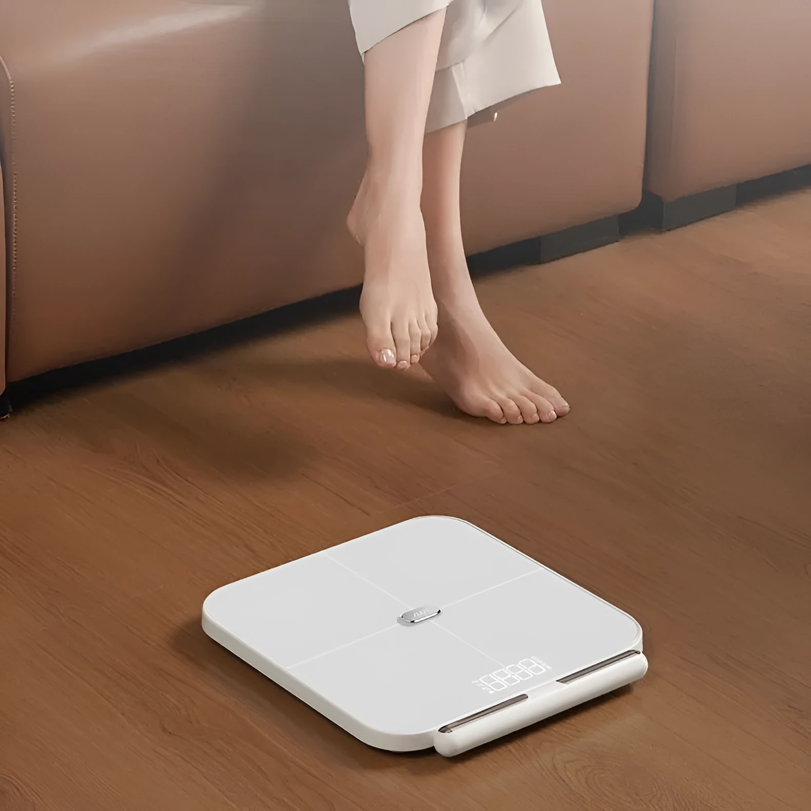 White smart body fat scale with 8 electrodes and a large LED display on a tempered glass platform.