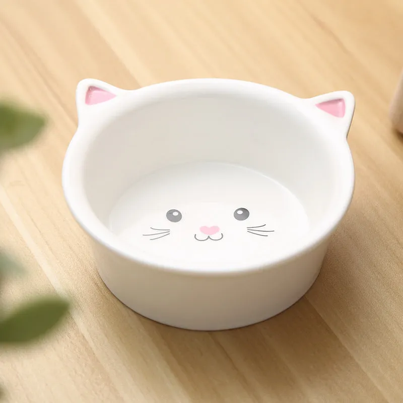Ceramic small cat face shape pet food bowl in black, porcelain material, with non-slip base