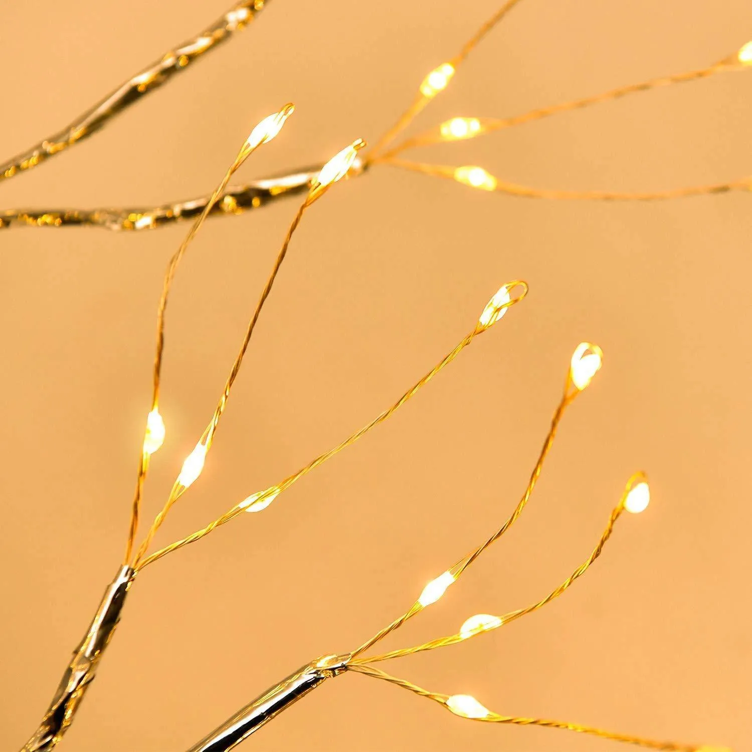 White LED tree-shaped lamp with bendable copper wire branches, 50cm tall, on a table.