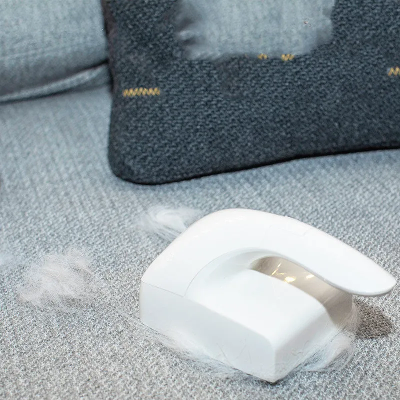 White ABS plastic pet hair remover roller with sticky adhesive surface for furniture and clothing