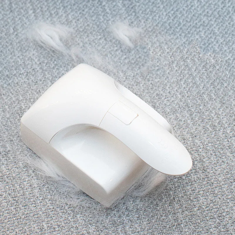 White ABS plastic pet hair remover roller with sticky adhesive surface for furniture and clothing