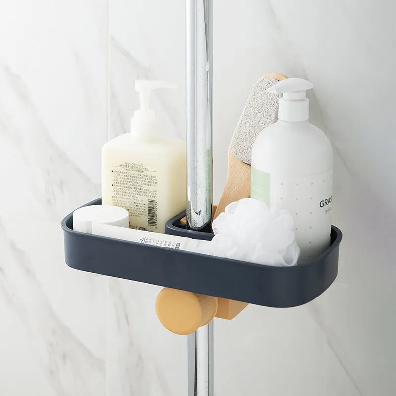 Blue sink shelf faucet holder with sponge and brush storage tray on a kitchen sink