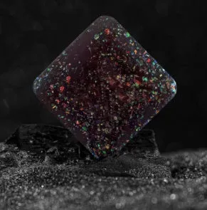 Galactic Edition resin desk gyro showing 4cm quadrilateral shape with cosmic pattern