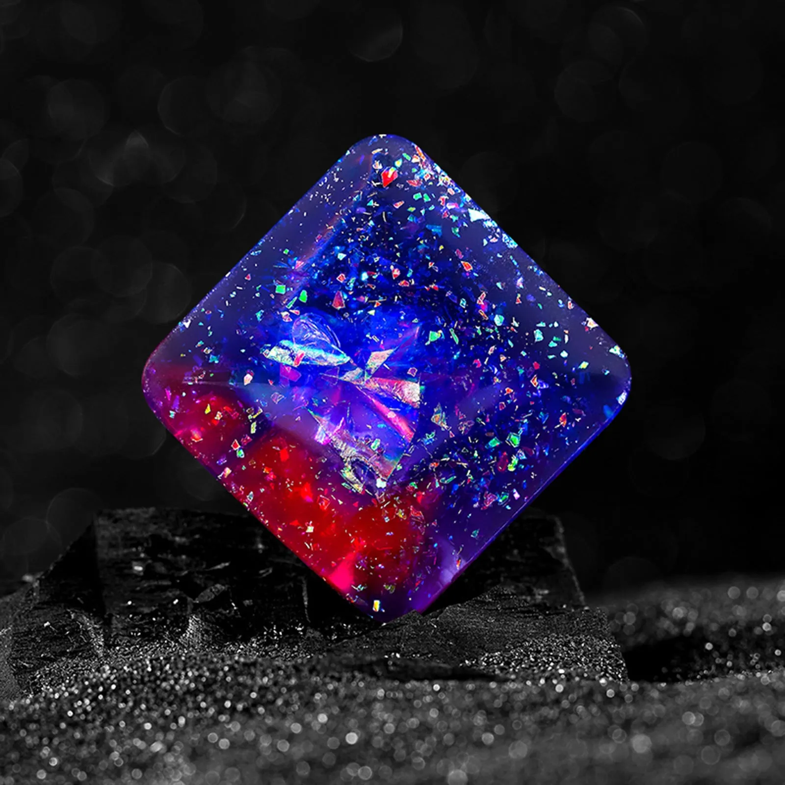Galactic Edition resin desk gyro showing 4cm quadrilateral shape with cosmic pattern