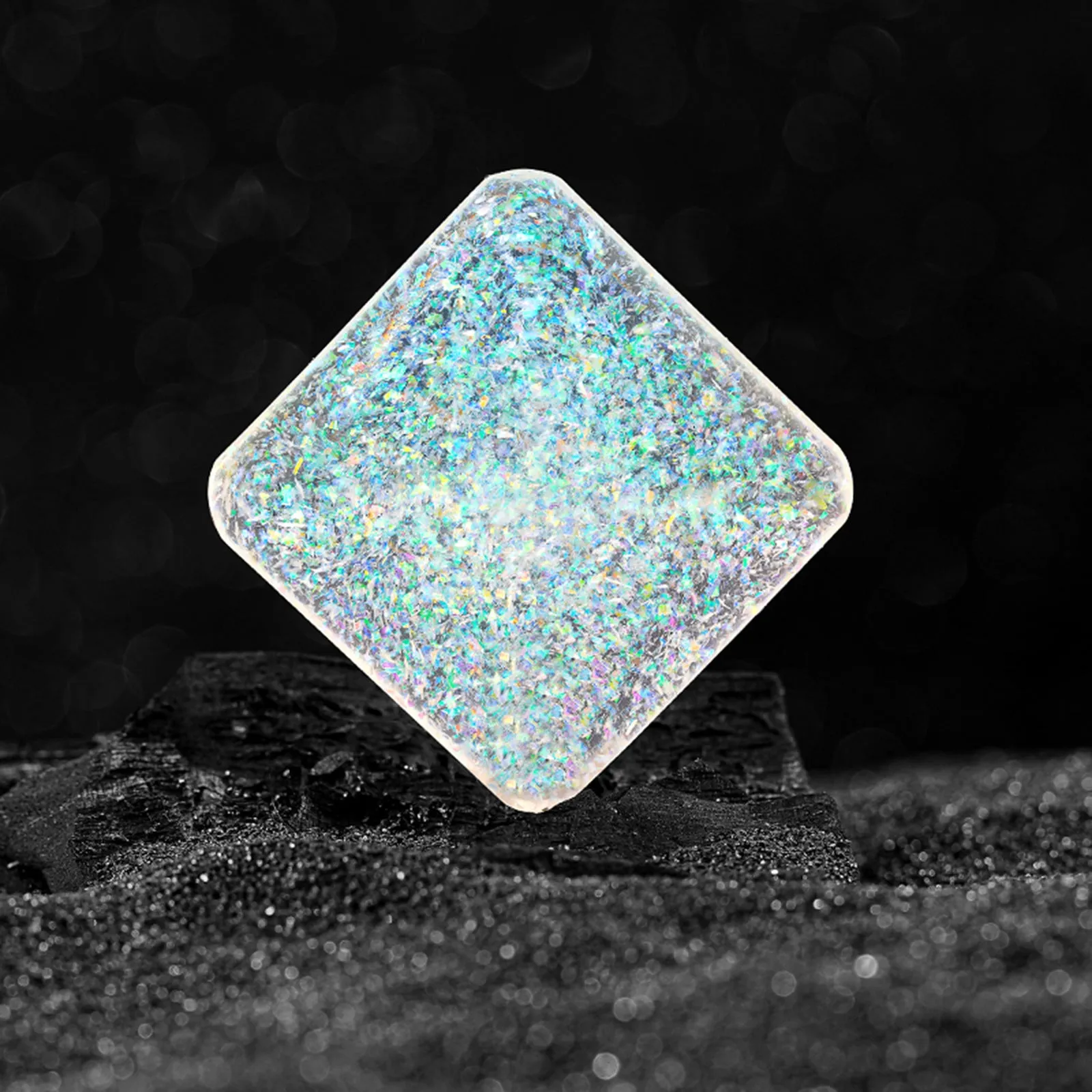 Galactic Edition resin desk gyro showing 4cm quadrilateral shape with cosmic pattern