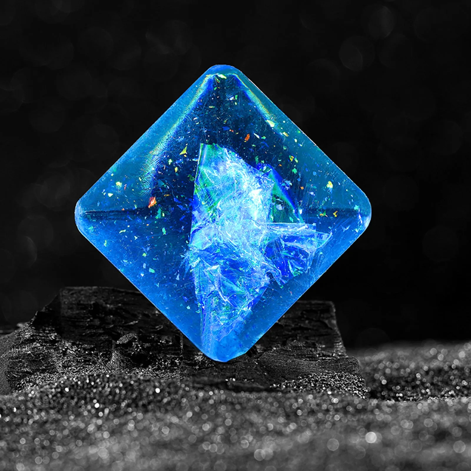 Galactic Edition resin desk gyro showing 4cm quadrilateral shape with cosmic pattern