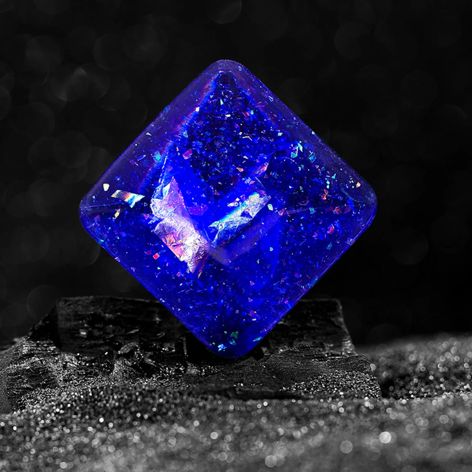 Galactic Edition resin desk gyro showing 4cm quadrilateral shape with cosmic pattern