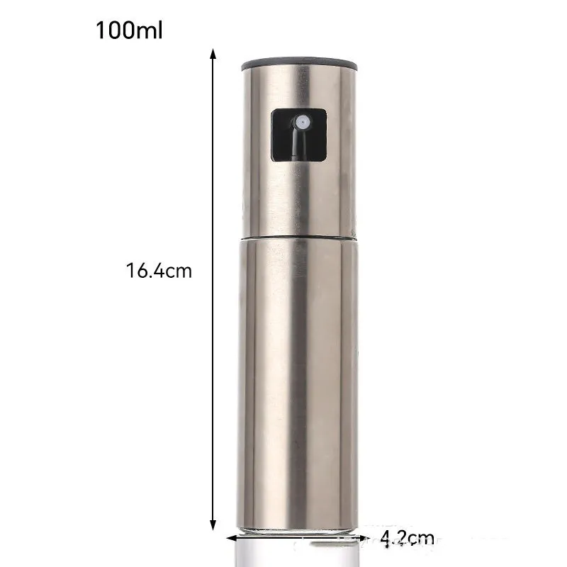 Press-type stainless steel oil spray bottle with 100ml capacity and glass body for kitchen use
