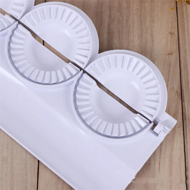 Pure white ABS plastic dumpling maker on a kitchen counter, compact design, modern simple style