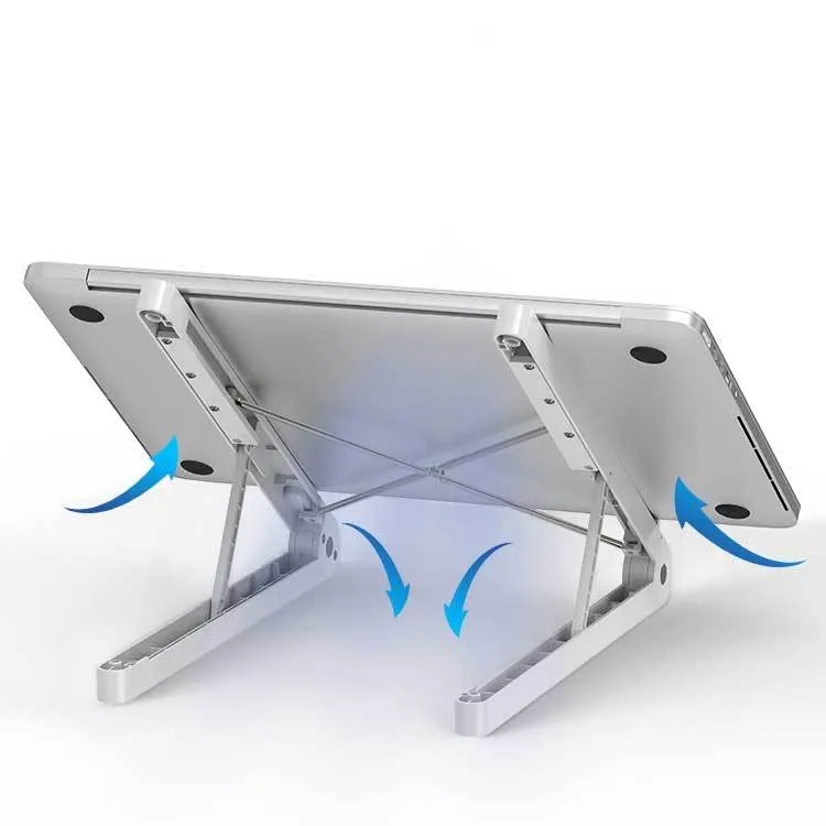 Folding plastic laptop stand desktop rack in white on a desk