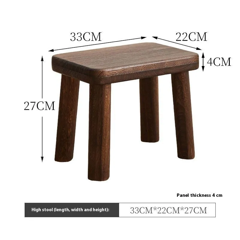 Solid wood household stool with distressed finish, shown as a changing stool or footrest.