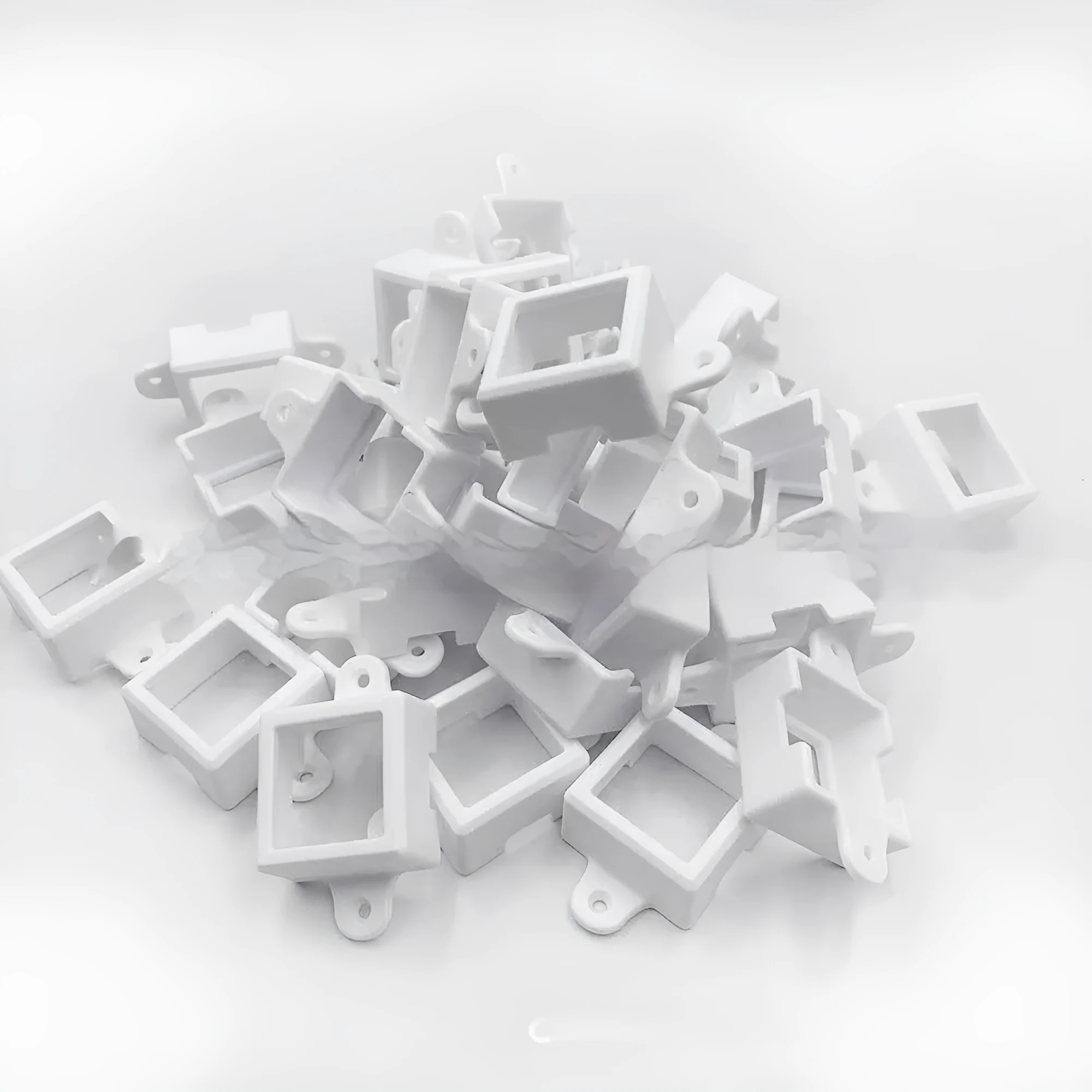 White plastic protective cover for LED light bracket, dimensions 1.7cm by 6cm.