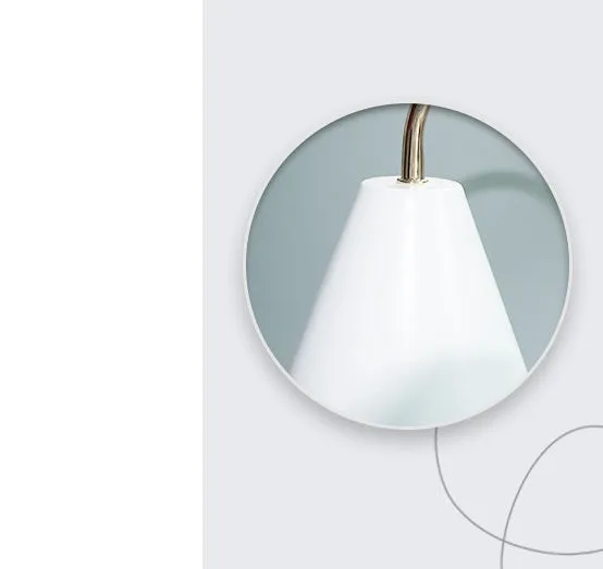 White and log coloured electric candle warmer lamp with dimmer switch on desk
