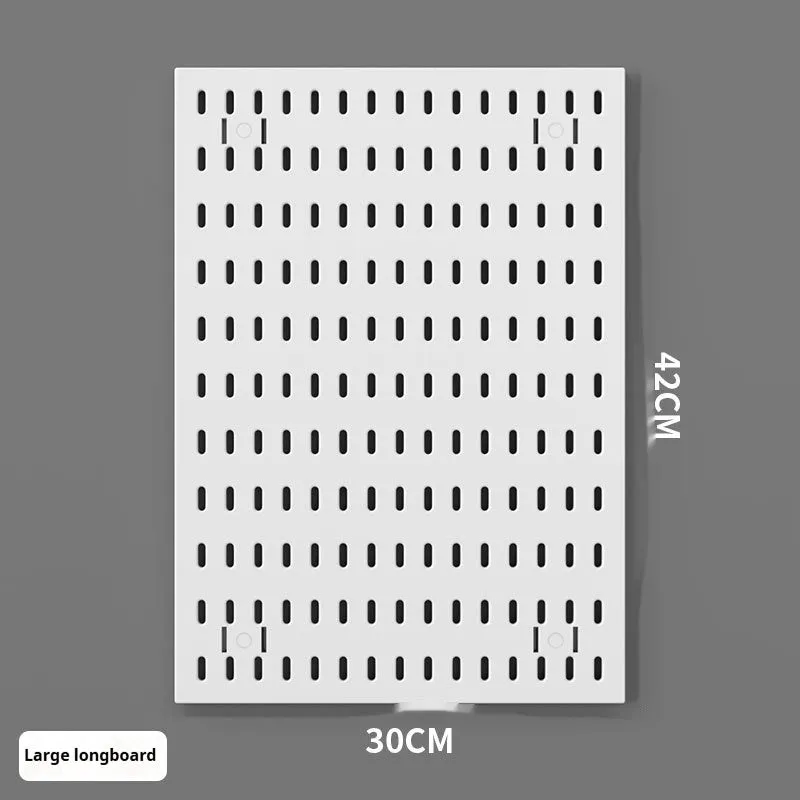 White punch-free plastic cable organisation board mounted on a wall with wires neatly wrapped.