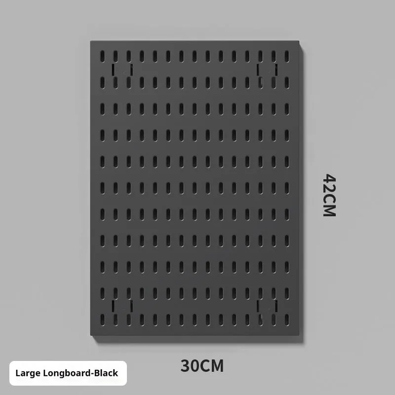 White punch-free plastic cable organisation board mounted on a wall with wires neatly wrapped.