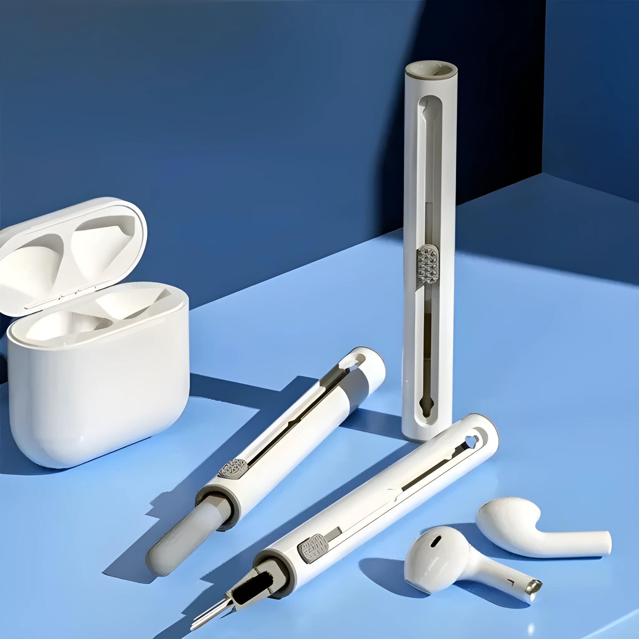 3 in 1 headset cleaning pen with metal tip and sponge on white background