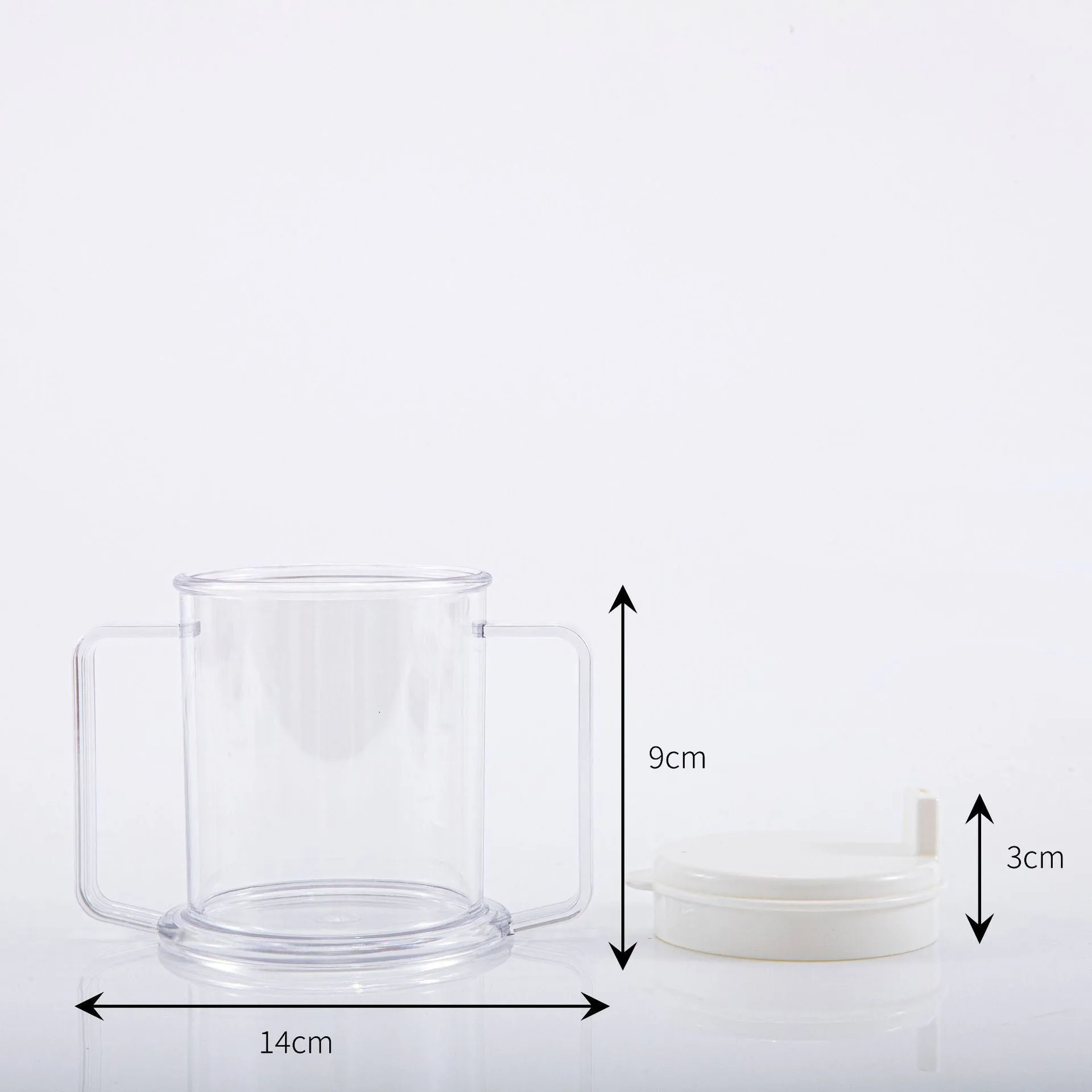 Transparent plastic drinking cup with a grey spill-proof lid on a white background.