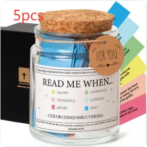 Glass Bible verses jar with cartoon style containing 90 scripture slips on a table