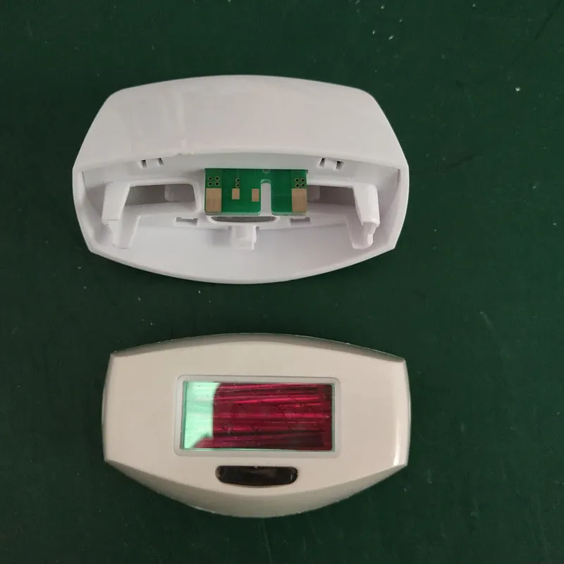 Laser hair remover with LCD display, 600,000 flashes, five energy levels, in green colour, 14x8x5cm, UK plug