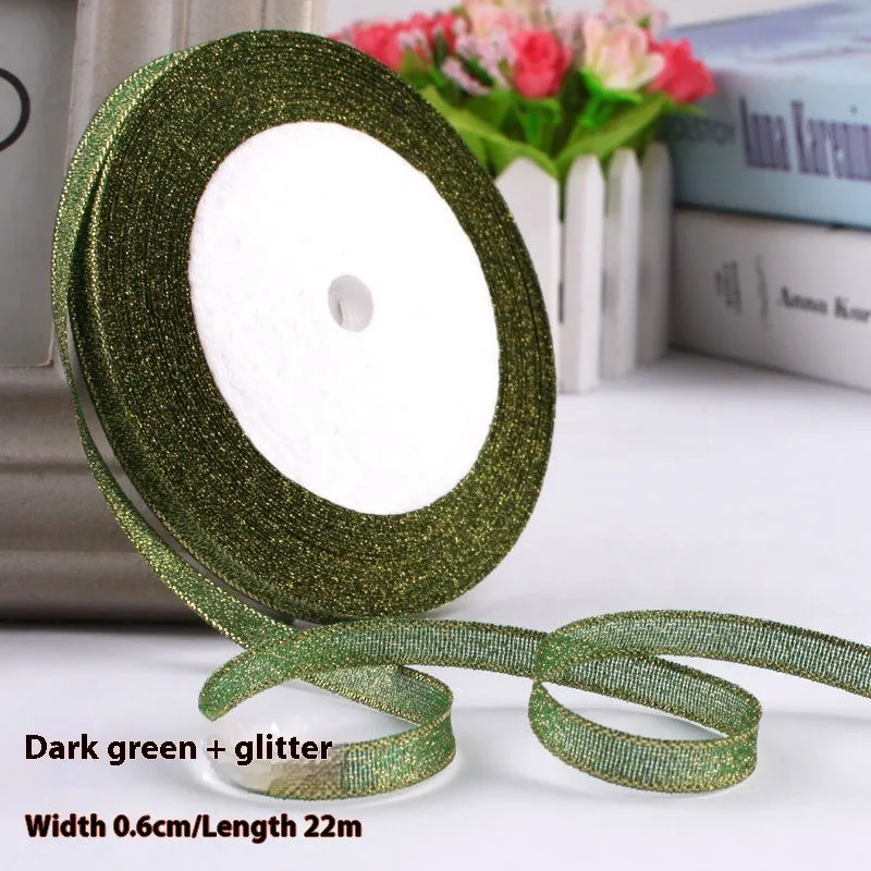 Roll of narrow 0.6cm wide polyester gift ribbon in a multicolour pattern.