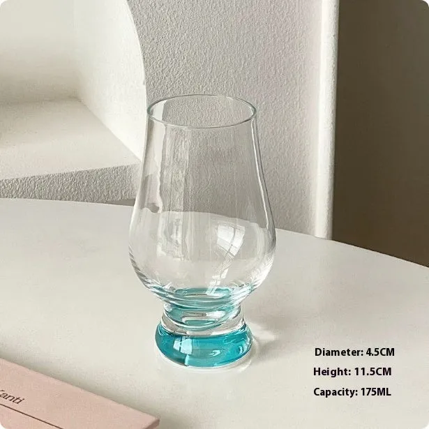 A medieval French simplicity design glass goblet showing colour variations like Bamboo Goblet and Blue Bottom Cup.