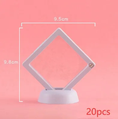 3D floating display case holding coins and jewellery between transparent membrane sheets