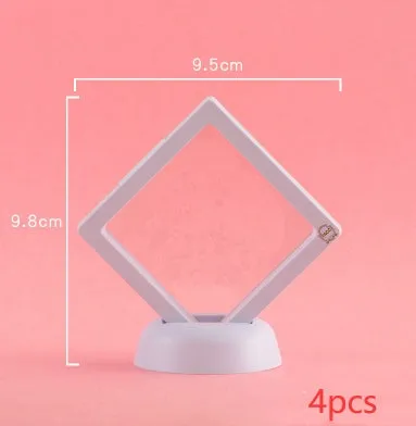 3D floating display case holding coins and jewellery between transparent membrane sheets