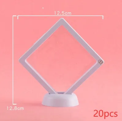 3D floating display case holding coins and jewellery between transparent membrane sheets