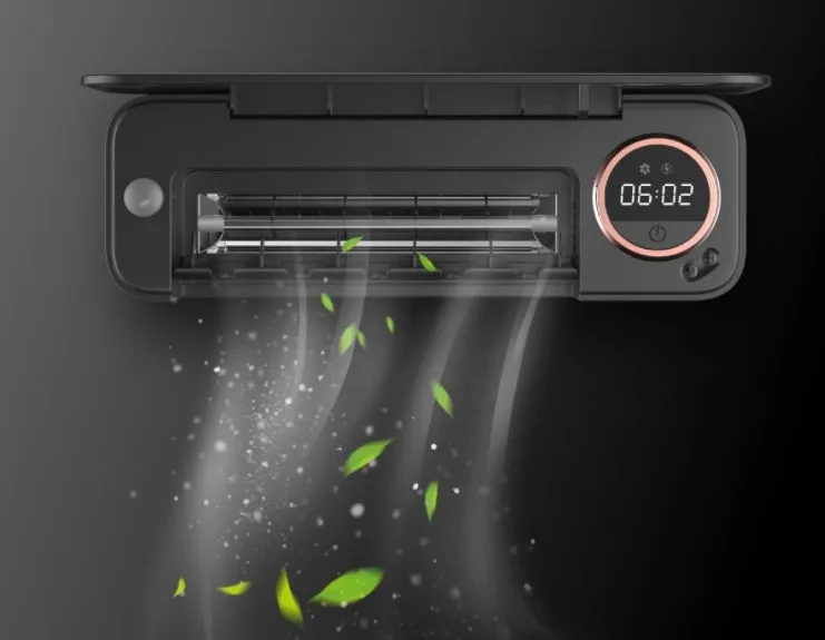 UV toothbrush holder steriliser with LED display attached to wall, showing countdown, black colour