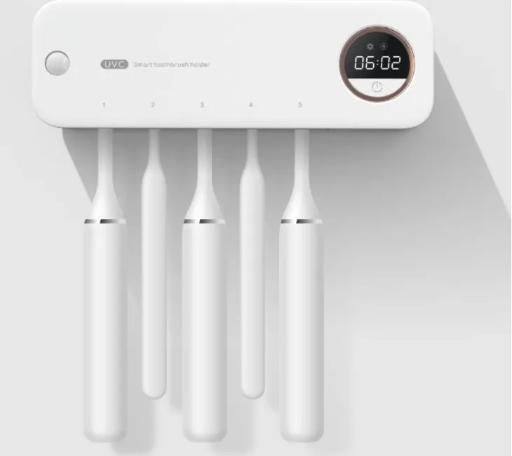 UV toothbrush holder steriliser with LED display attached to wall, showing countdown, black colour