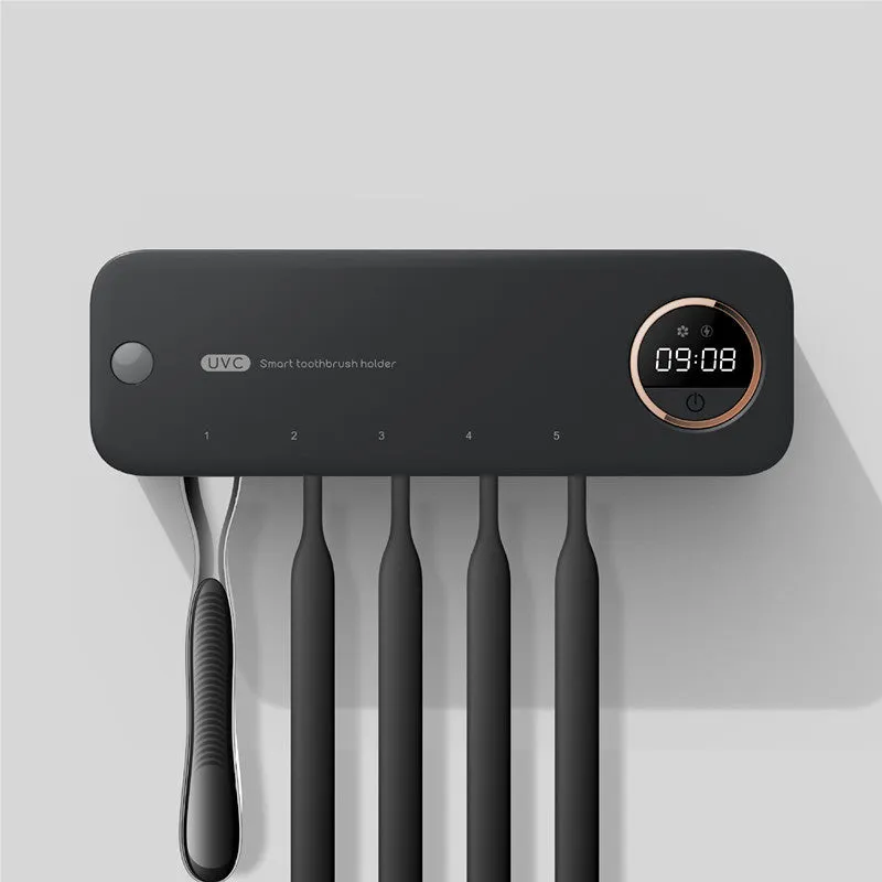 UV toothbrush holder steriliser with LED display attached to wall, showing countdown, black colour