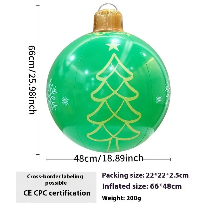 Large red and white inflatable Christmas ball with flashing lights in a garden setting
