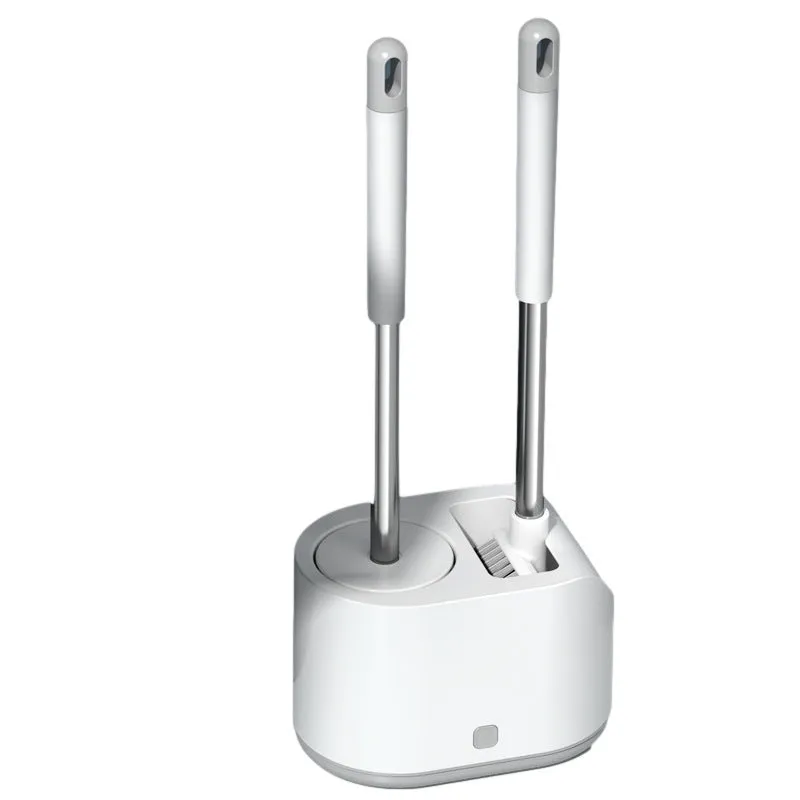 White silicone toilet brush set with long handle, soft TPR head, and second cleaning brush on a bathroom floor
