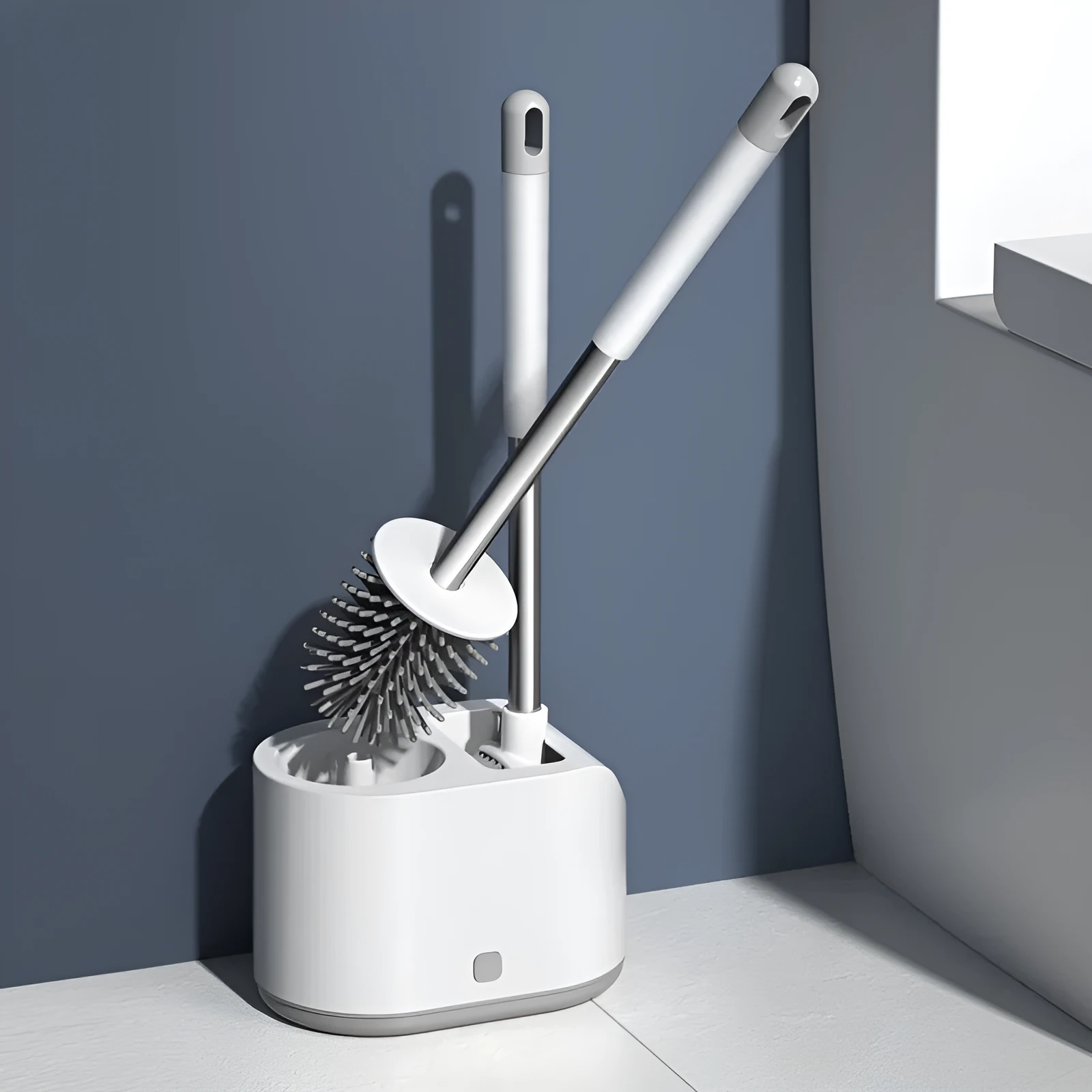 White silicone toilet brush set with long handle, soft TPR head, and second cleaning brush on a bathroom floor