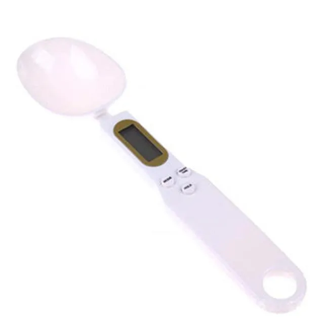 Portable digital measuring spoon with LCD display and 500g capacity in black, on white background