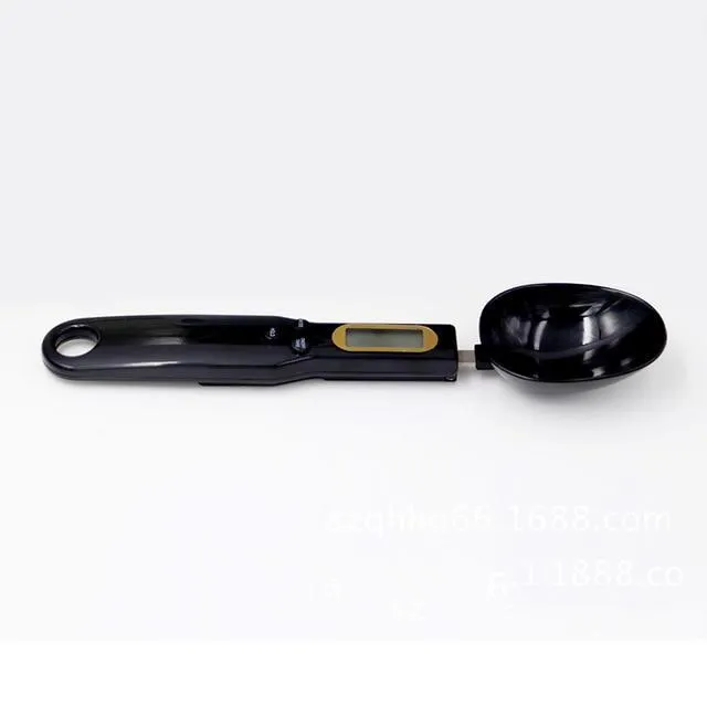Portable digital measuring spoon with LCD display and 500g capacity in black, on white background