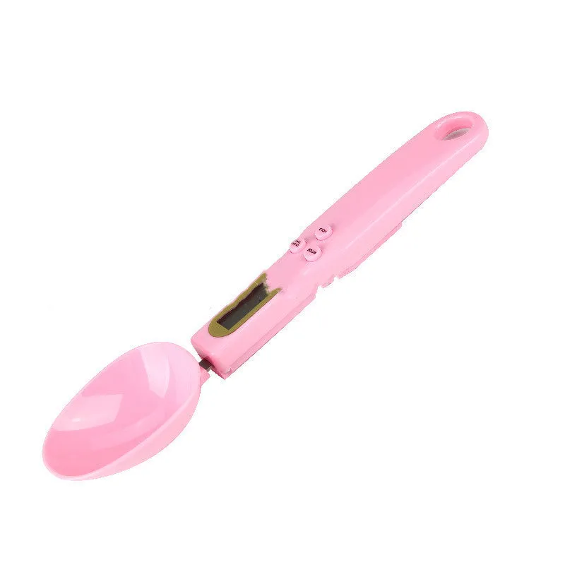 Portable digital measuring spoon with LCD display and 500g capacity in black, on white background